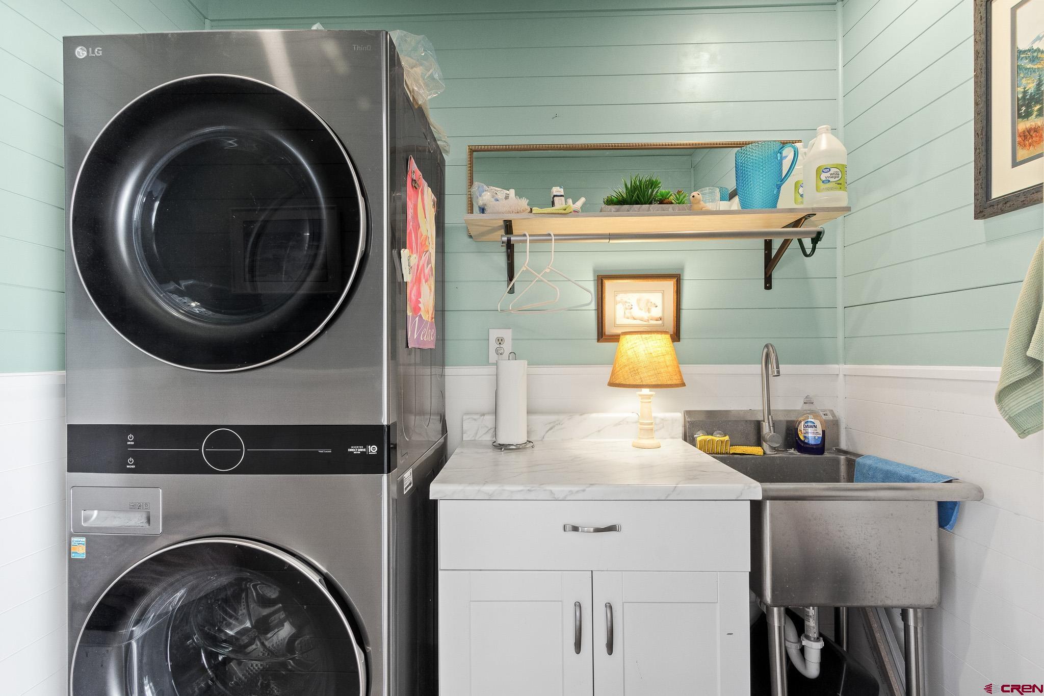 13720 6000th Road Montrose, CO 81403 - Photo 28 of 36 a bathroom with a washer and dryer