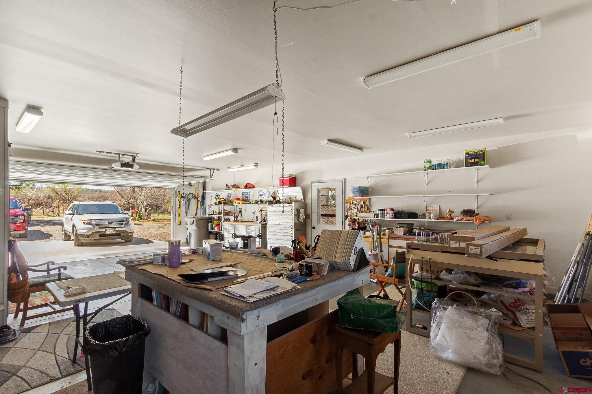 13720 6000th Road Montrose, CO 81403 - Photo 29 of 36 a view of a room that has a lot of stuff and furniture