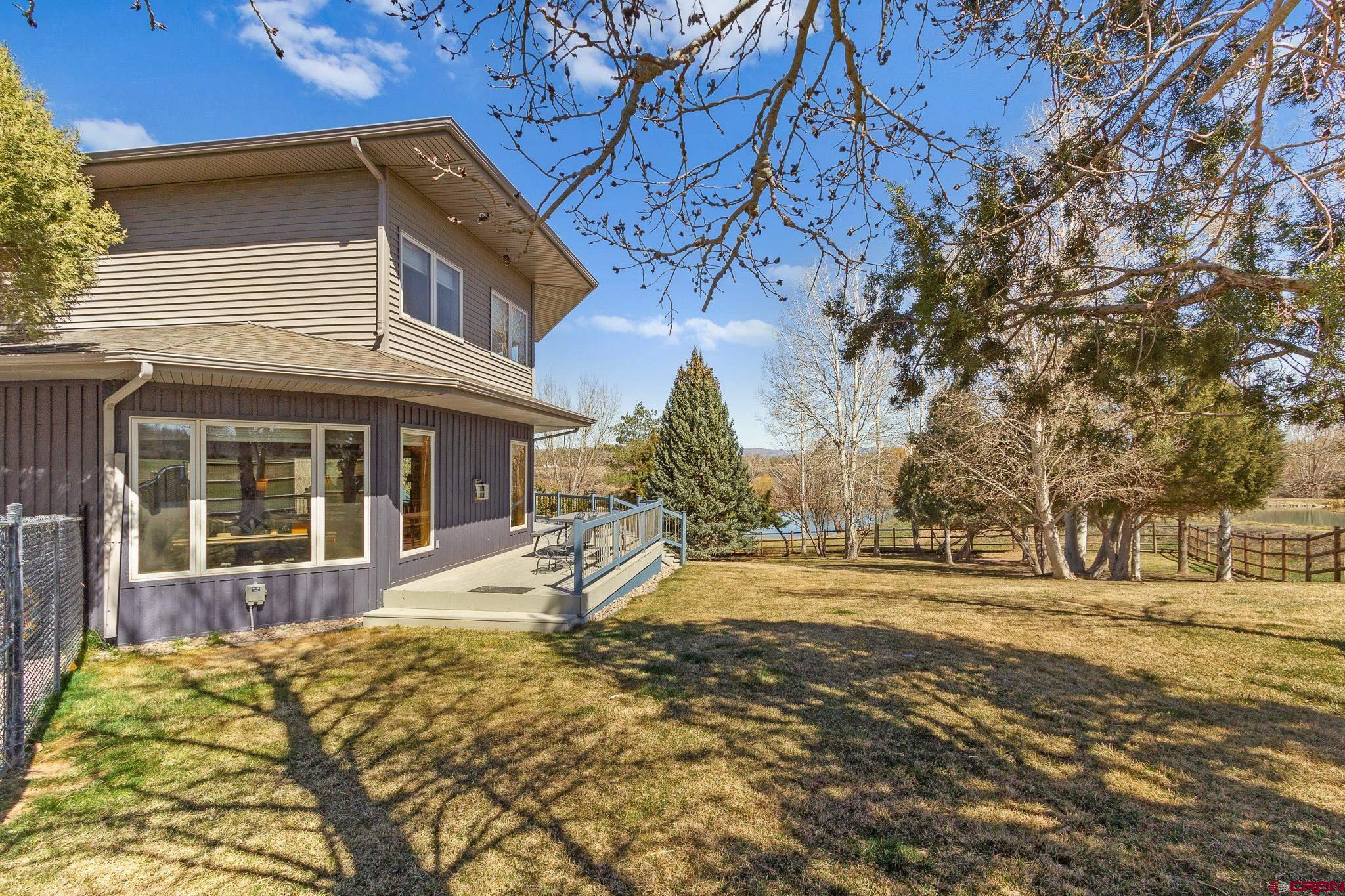 13720 6000th Road Montrose, CO 81403 - Photo 30 of 36 a view of a house with snow on the wall