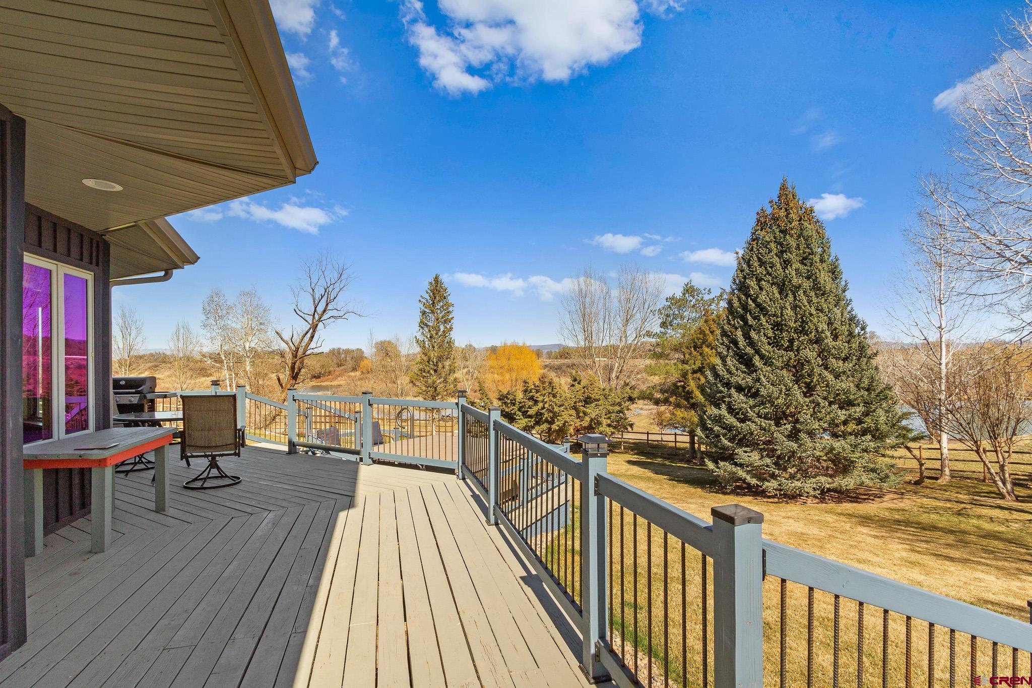 13720 6000th Road Montrose, CO 81403 - Photo 35 of 36 a view of a balcony with wooden floor