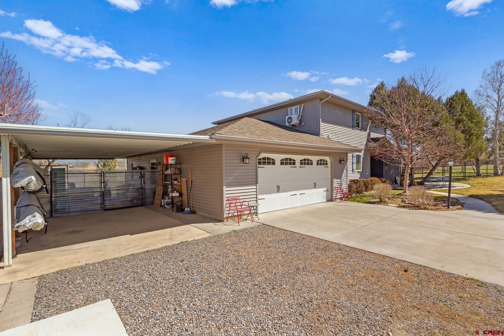 13720 6000th Road Montrose, CO 81403 - Photo 7 of 36 a front view of a building with parking
