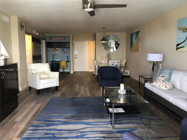 a bedroom with a bed and a table