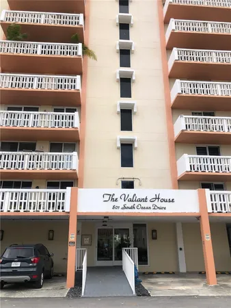 a view of outdoor space with yard and palm trees