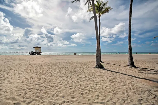 a room with gym equipment and windows