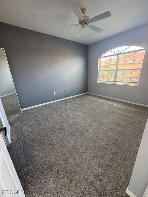 15625 Ocean Walk Circle, Unit 309 Fort Myers, FL 33908 - Photo 12 of 16 a view of an empty room with a window