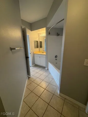 a bathroom with a sink and a shower