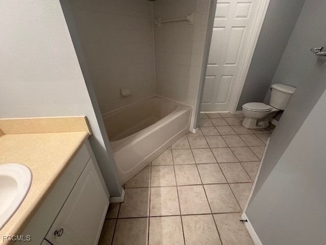 15625 Ocean Walk Circle, Unit 309 Fort Myers, FL 33908 - Photo 14 of 16 a bathroom with a sink and a shower