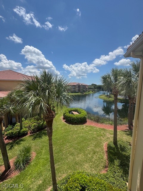 15625 Ocean Walk Circle, Unit 309 Fort Myers, FL 33908 - Photo 16 of 16 a view of a lake from a yard