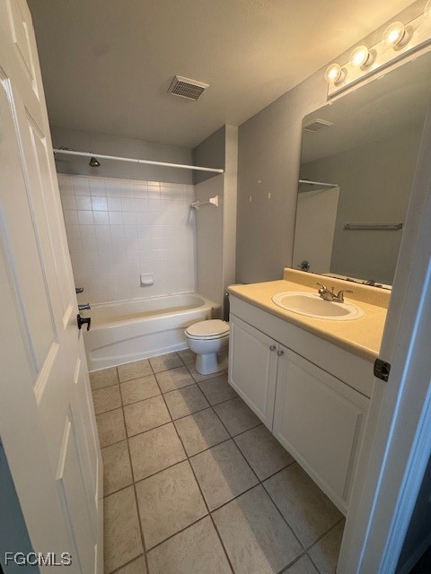 15625 Ocean Walk Circle, Unit 309 Fort Myers, FL 33908 - Photo 9 of 16 a bathroom with a toilet a sink and shower