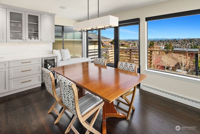 a dining room with furniture window wooden floor