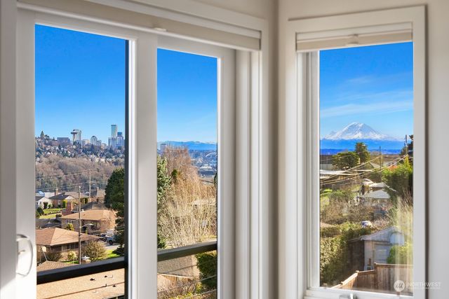 a view of a glass door with a balcony from door