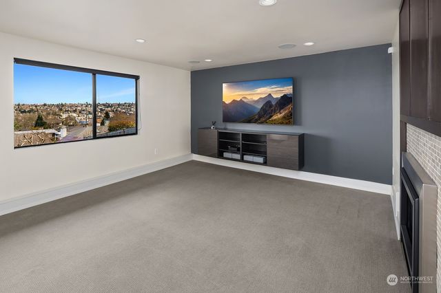 a view of workspace with furniture and window