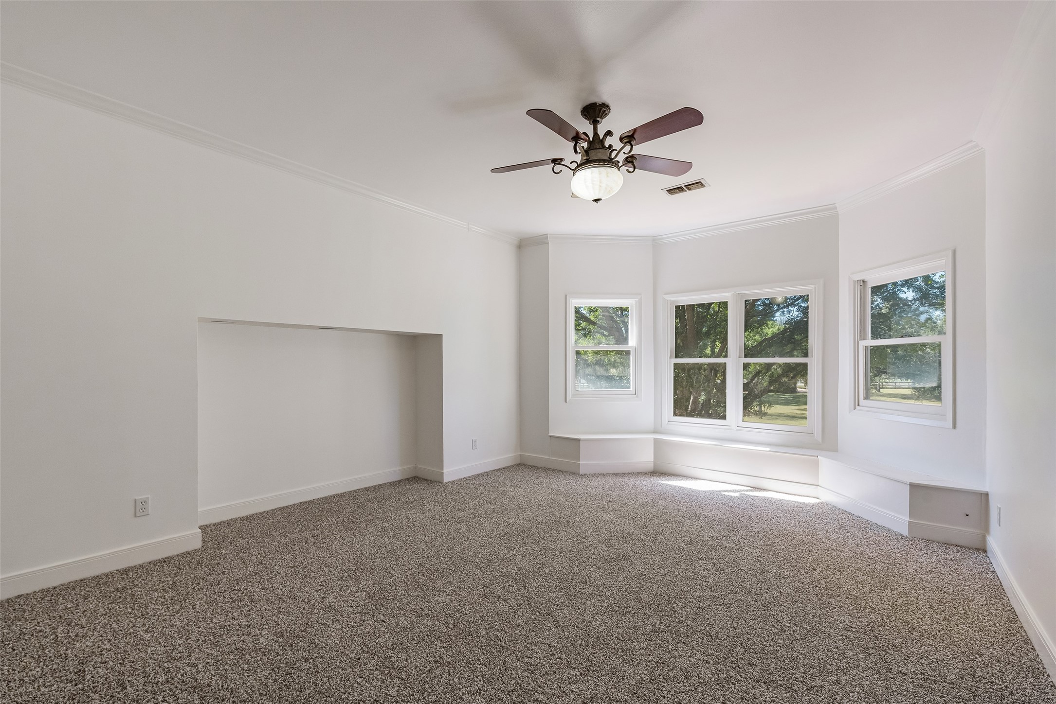 4610 Lea Lane Fulshear, TX 77406 - Photo 35 of 50 a view of an empty room with a window