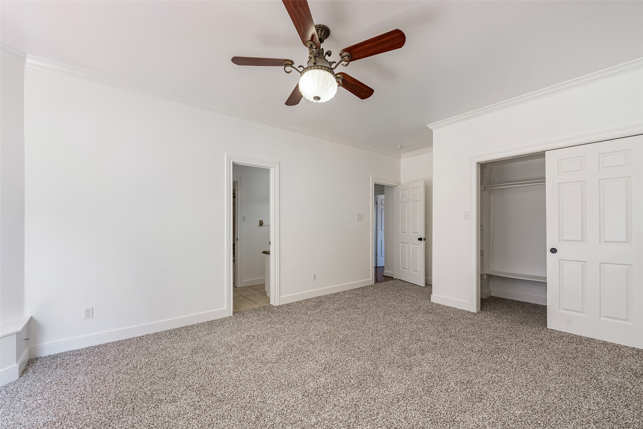 4610 Lea Lane Fulshear, TX 77406 - Photo 36 of 50 an empty room with chandelier fan