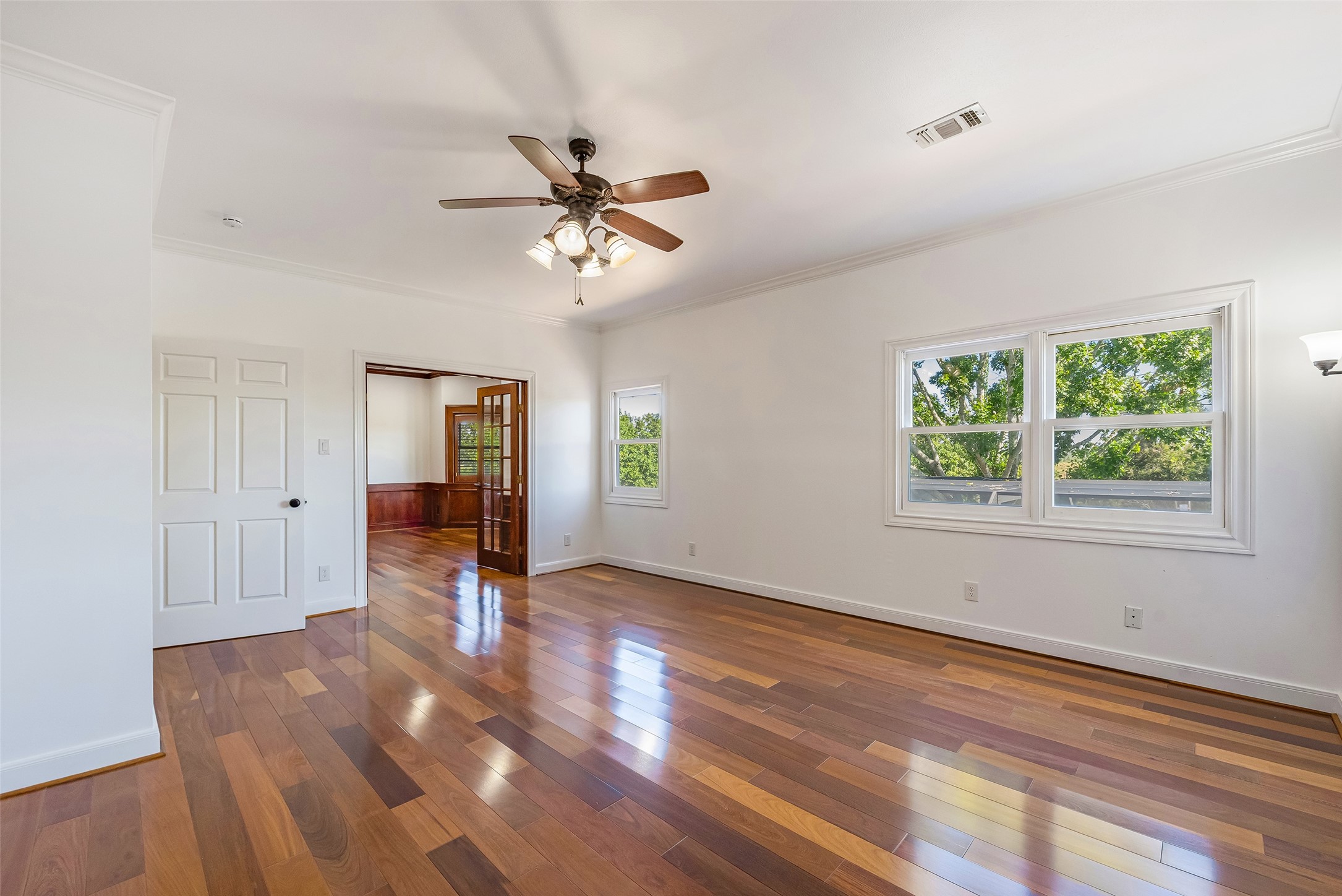 4610 Lea Lane Fulshear, TX 77406 - Photo 38 of 50 wooden floor in an empty room with a window