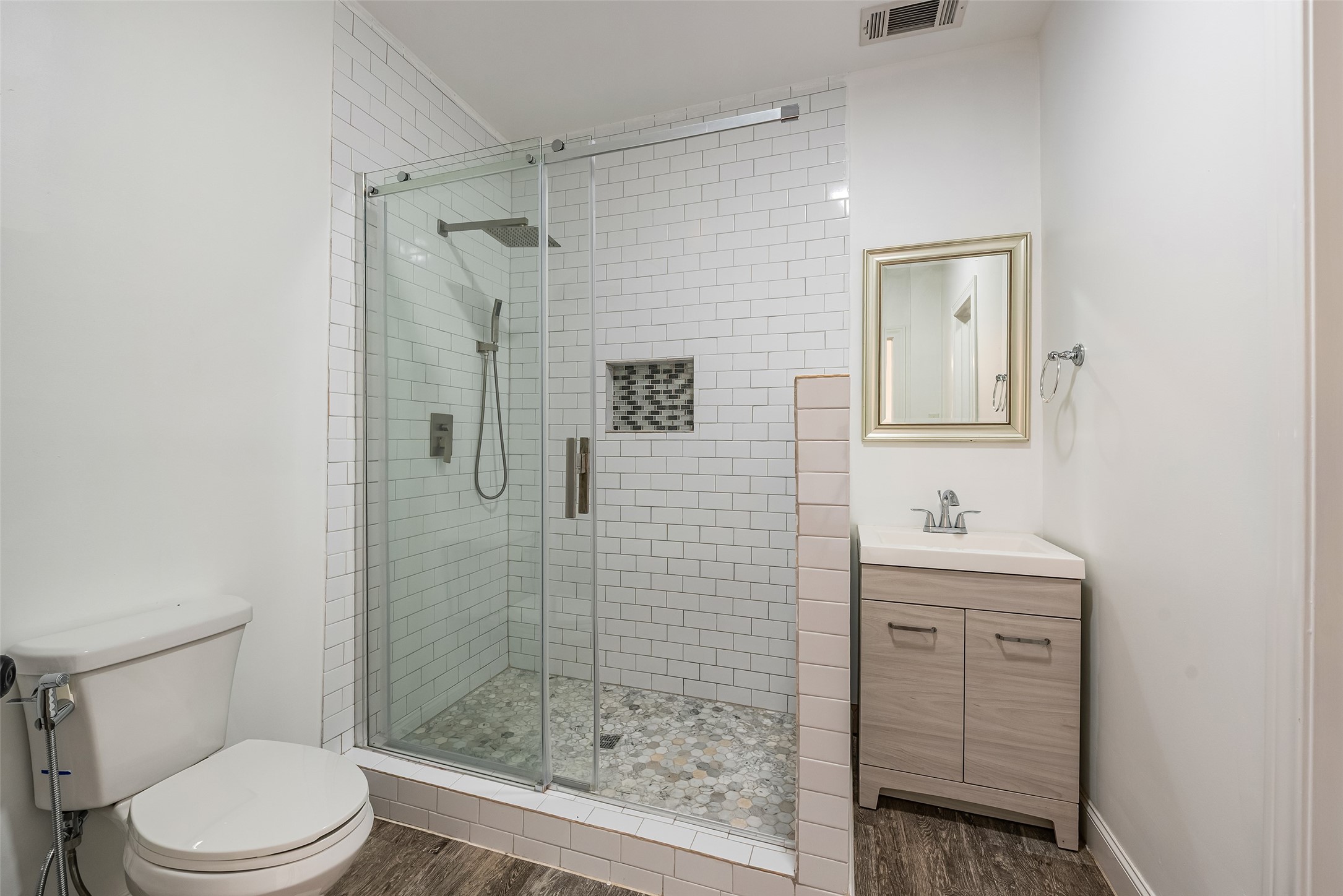 4610 Lea Lane Fulshear, TX 77406 - Photo 40 of 50 a bathroom with a shower a toilet and sink