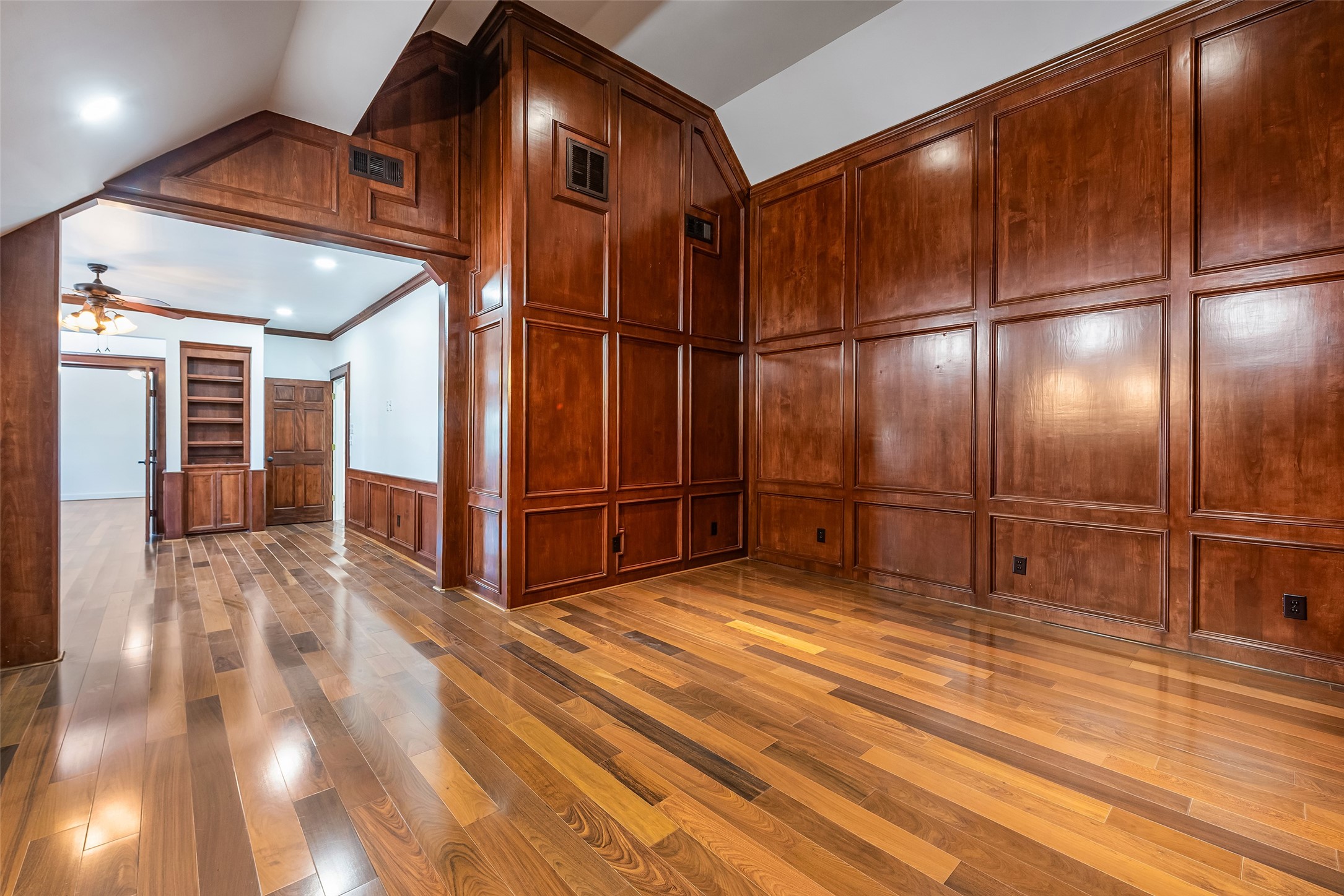 4610 Lea Lane Fulshear, TX 77406 - Photo 42 of 50 a view of an empty room with wooden floor