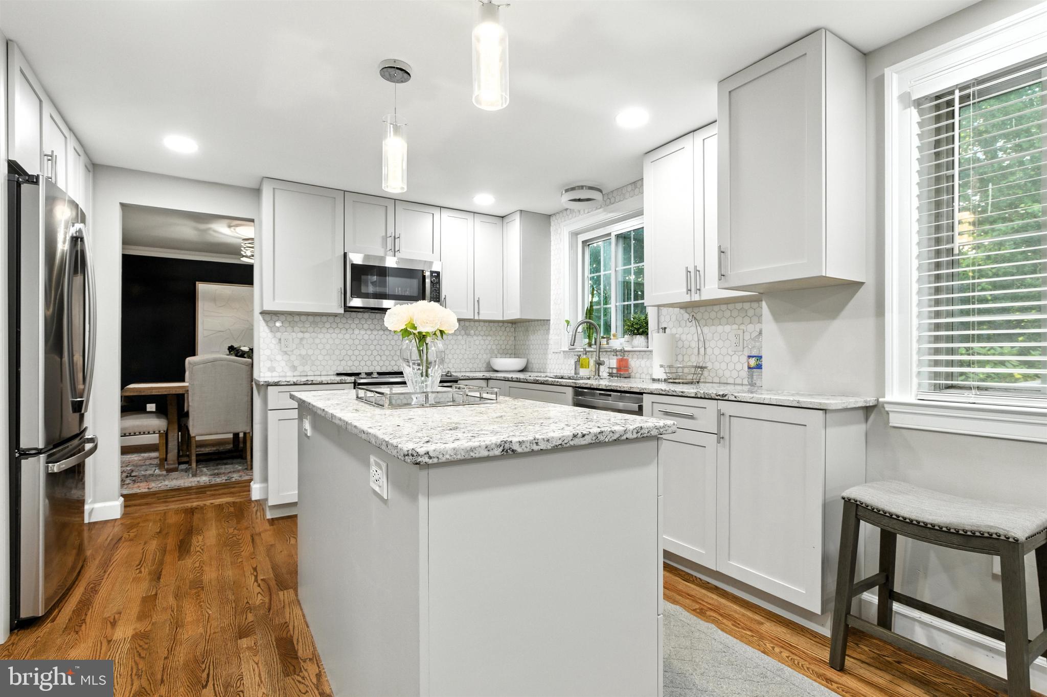 21804 Goshen School Road Gaithersburg, MD 20882 - Photo 1 of 37 a kitchen with stainless steel appliances granite countertop a sink stove and refrigerator
