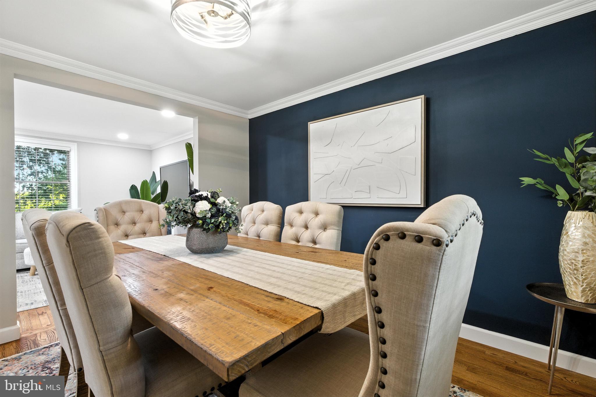 21804 Goshen School Road Gaithersburg, MD 20882 - Photo 11 of 37 a dining room with furniture and wooden floor