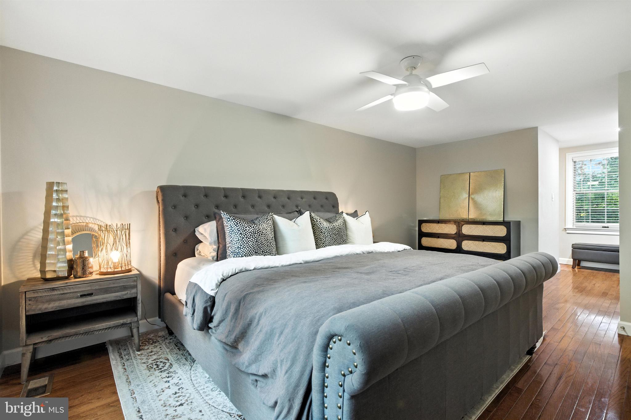 21804 Goshen School Road Gaithersburg, MD 20882 - Photo 18 of 37 a bed room with a bed and a window