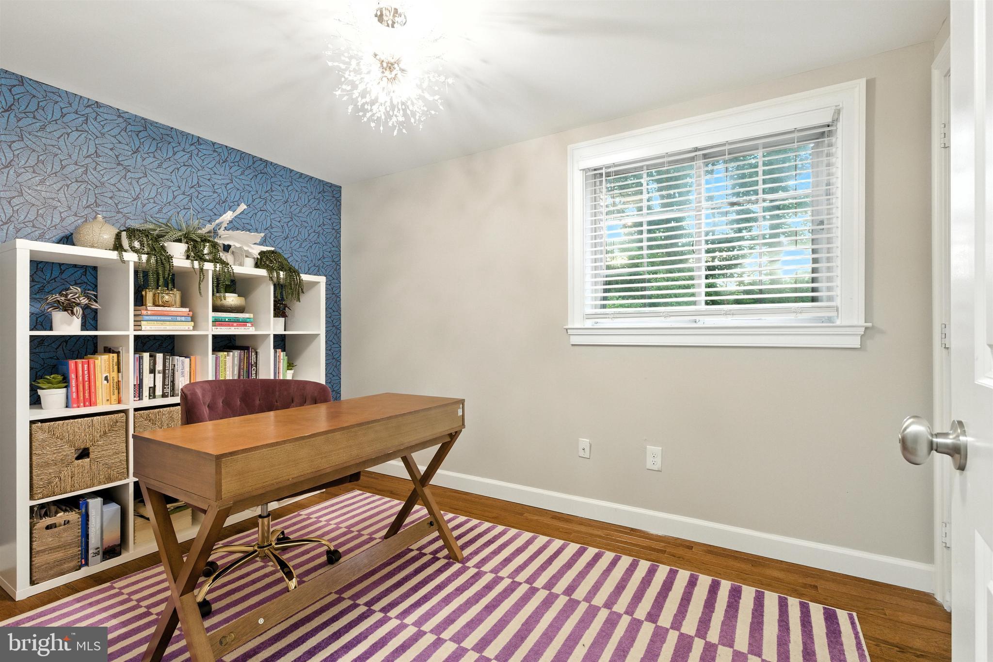 21804 Goshen School Road Gaithersburg, MD 20882 - Photo 27 of 37 a view of a workspace with furniture and a window