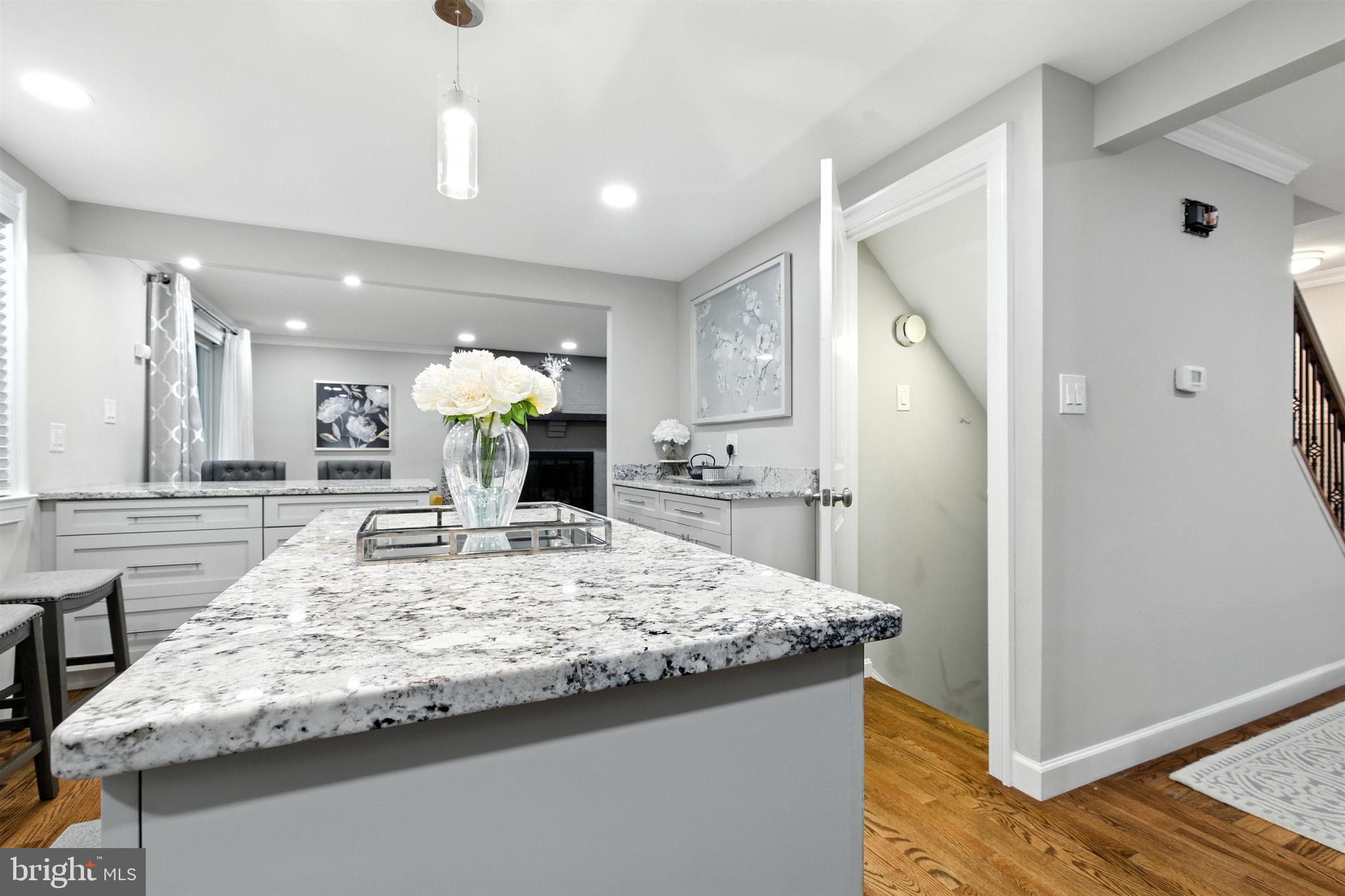 21804 Goshen School Road Gaithersburg, MD 20882 - Photo 9 of 37 a bathroom with a granite countertop sink and a mirror