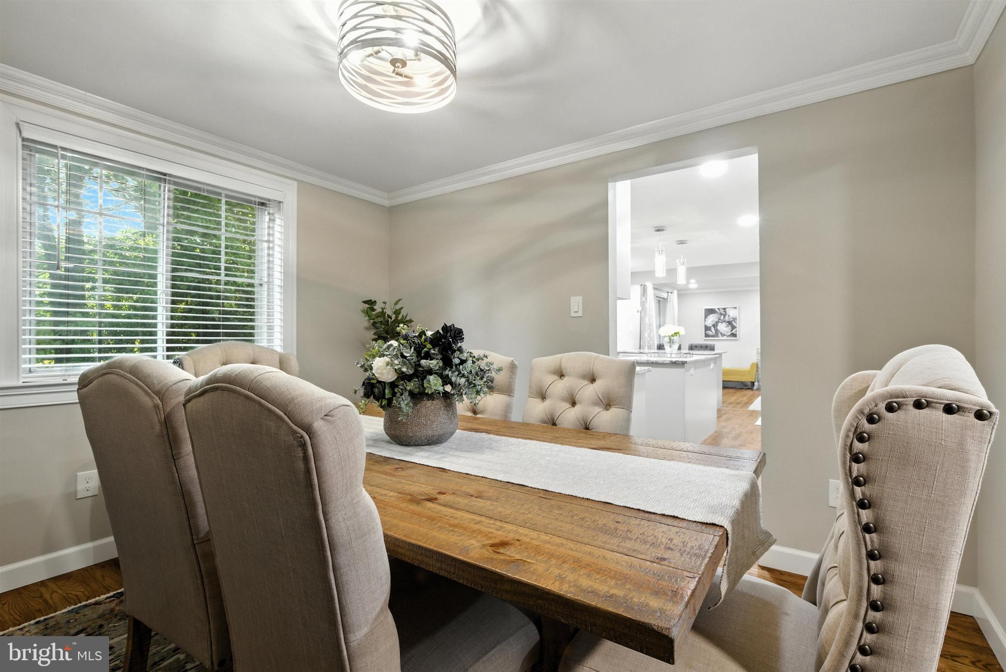 21804 Goshen School Road Gaithersburg, MD 20882 - Photo 10 of 37 a living room with furniture and a large window