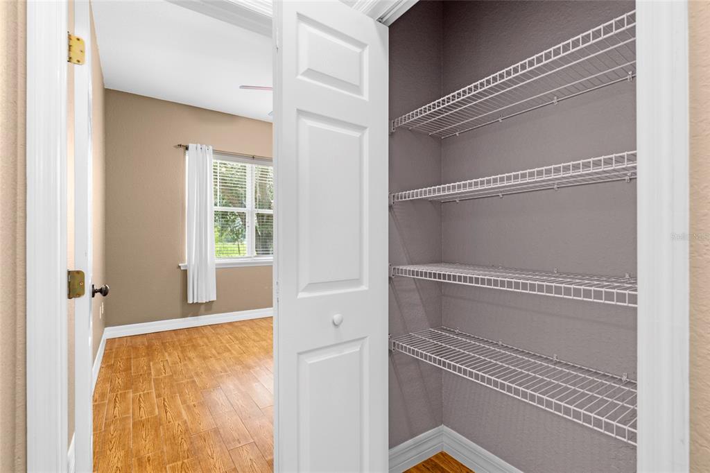 4405 North Wilder Road Plant City, FL 33565 - Photo 31 of 78 a view of a room with wooden floor and windows