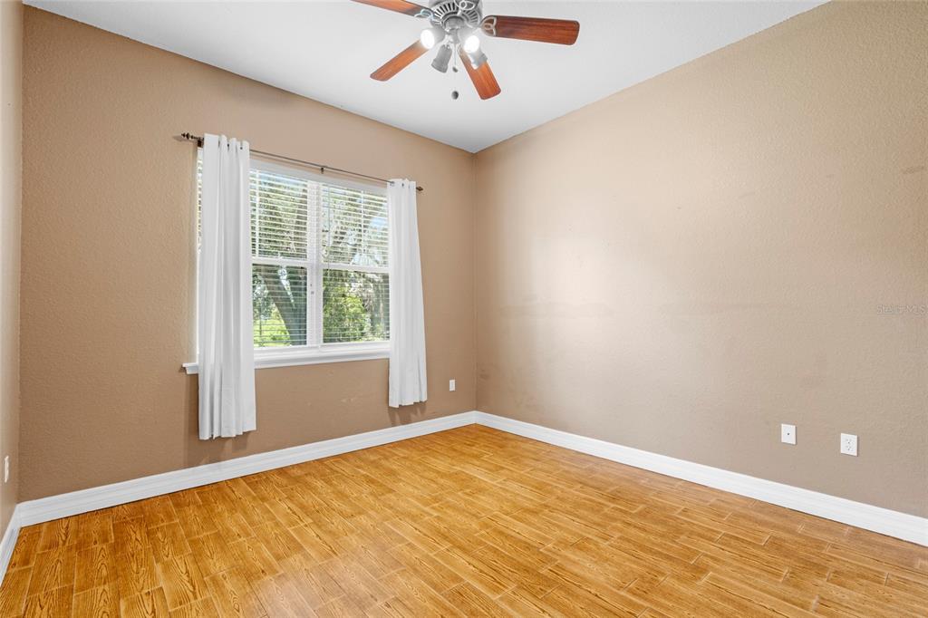 4405 North Wilder Road Plant City, FL 33565 - Photo 32 of 78 a view of an empty room with a window