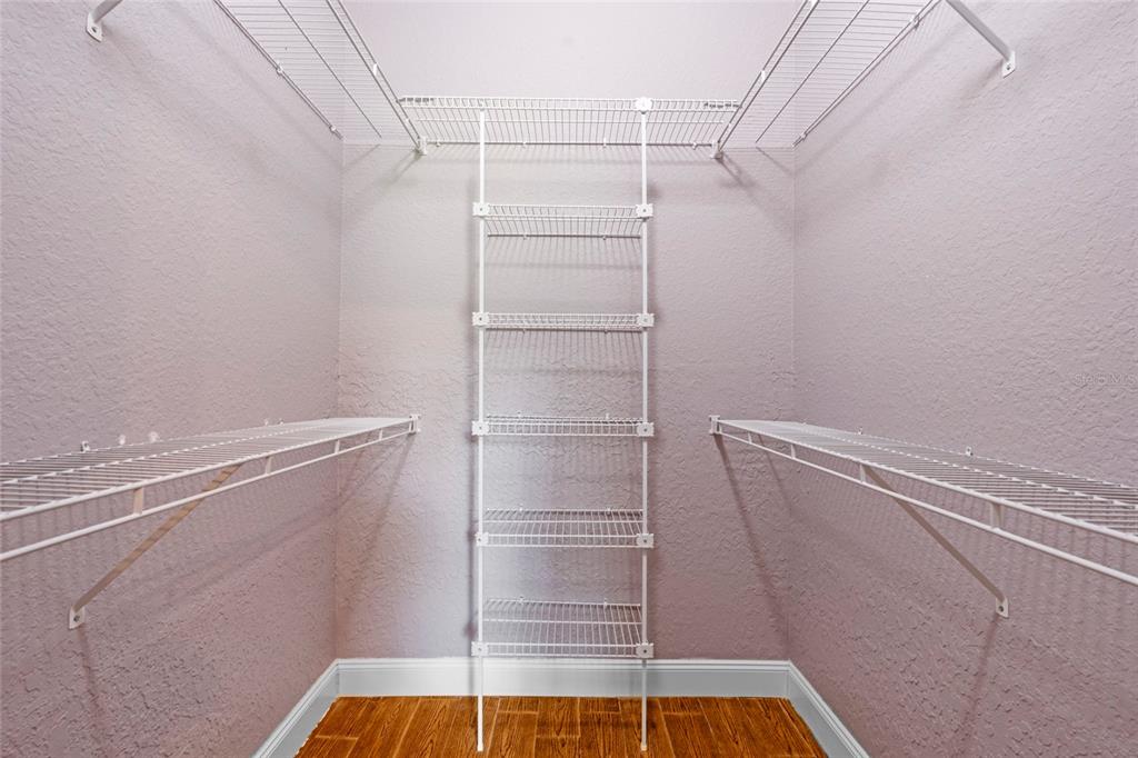 4405 North Wilder Road Plant City, FL 33565 - Photo 34 of 78 a view of walk in closet with empty racks