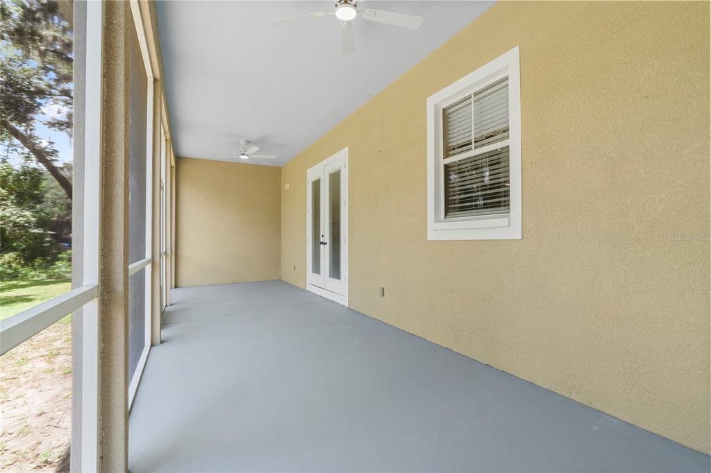 4405 North Wilder Road Plant City, FL 33565 - Photo 38 of 78 a view of a hallway with windows