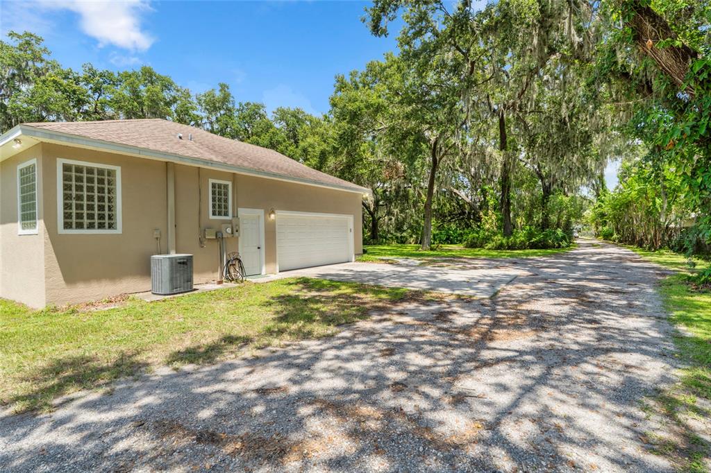4405 North Wilder Road Plant City, FL 33565 - Photo 41 of 78 a view of a house with a yard