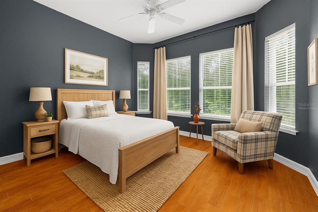 4405 North Wilder Road Plant City, FL 33565 - Photo 49 of 78 a bedroom with a bed and a couch