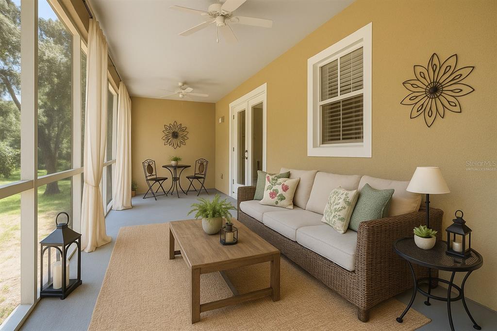 4405 North Wilder Road Plant City, FL 33565 - Photo 53 of 78 a living room with furniture and a flat screen tv