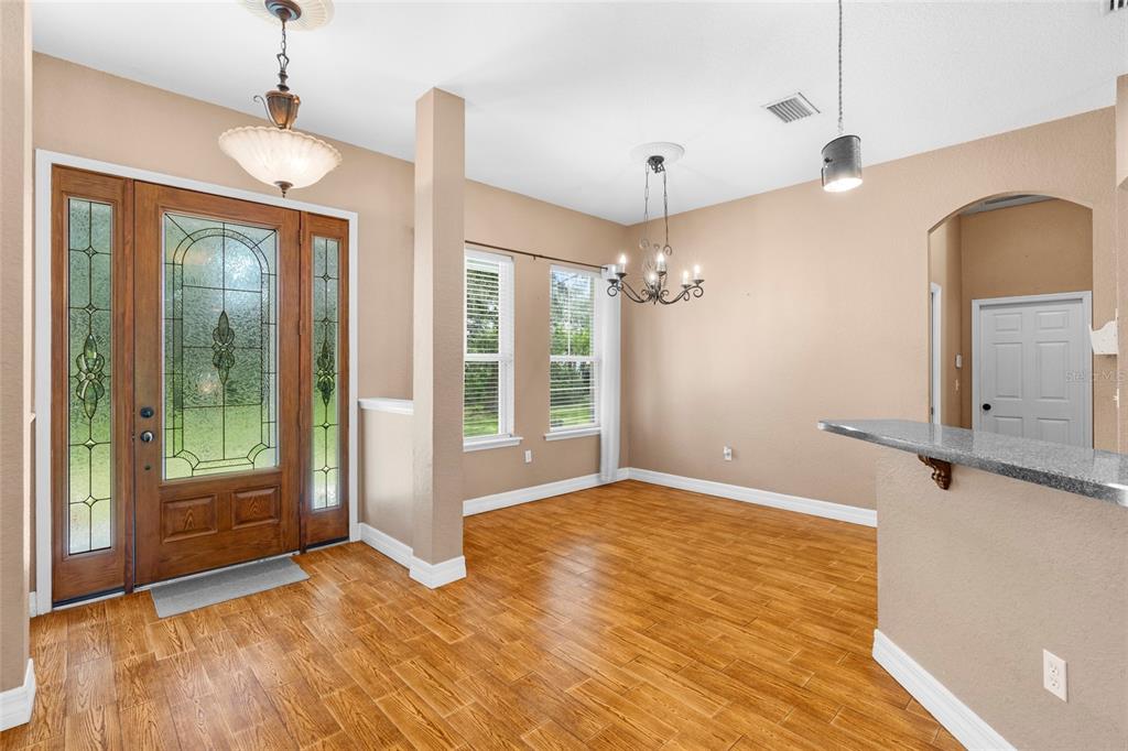 4405 North Wilder Road Plant City, FL 33565 - Photo 7 of 78 a view of an empty room with glass door