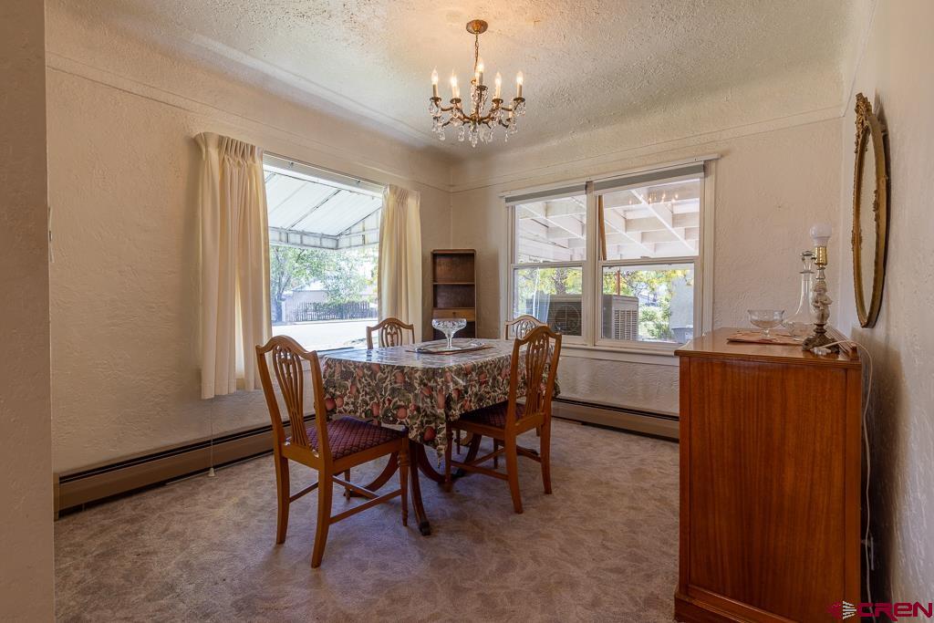 420 West 4th Street Cortez, CO 81321 - Photo 5 of 25 a view of a dining room with furniture window and outside view