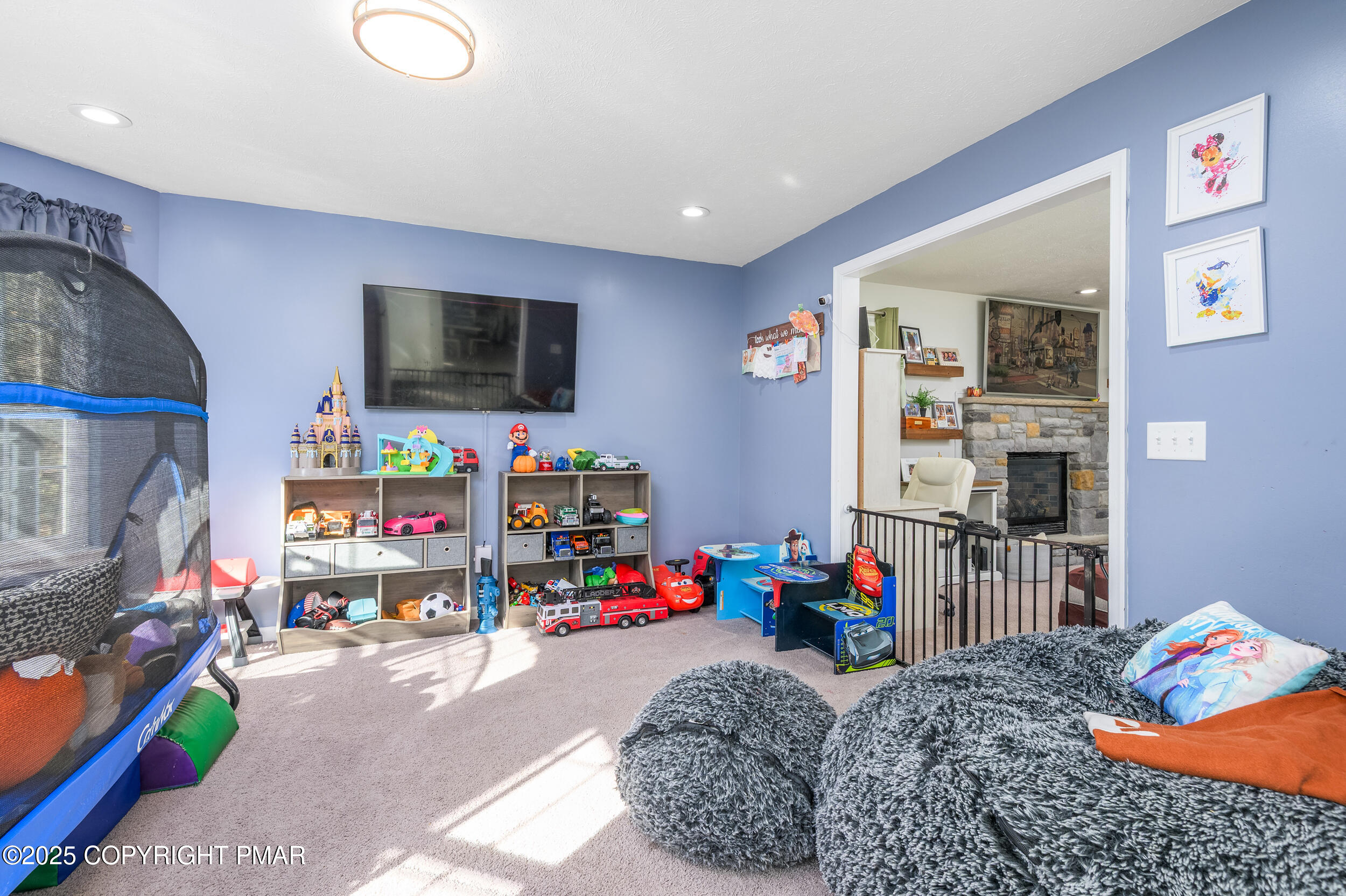 322 Russell Court Effort, PA 18330 - Photo 11 of 45 a bed room with a bed and a flat screen tv