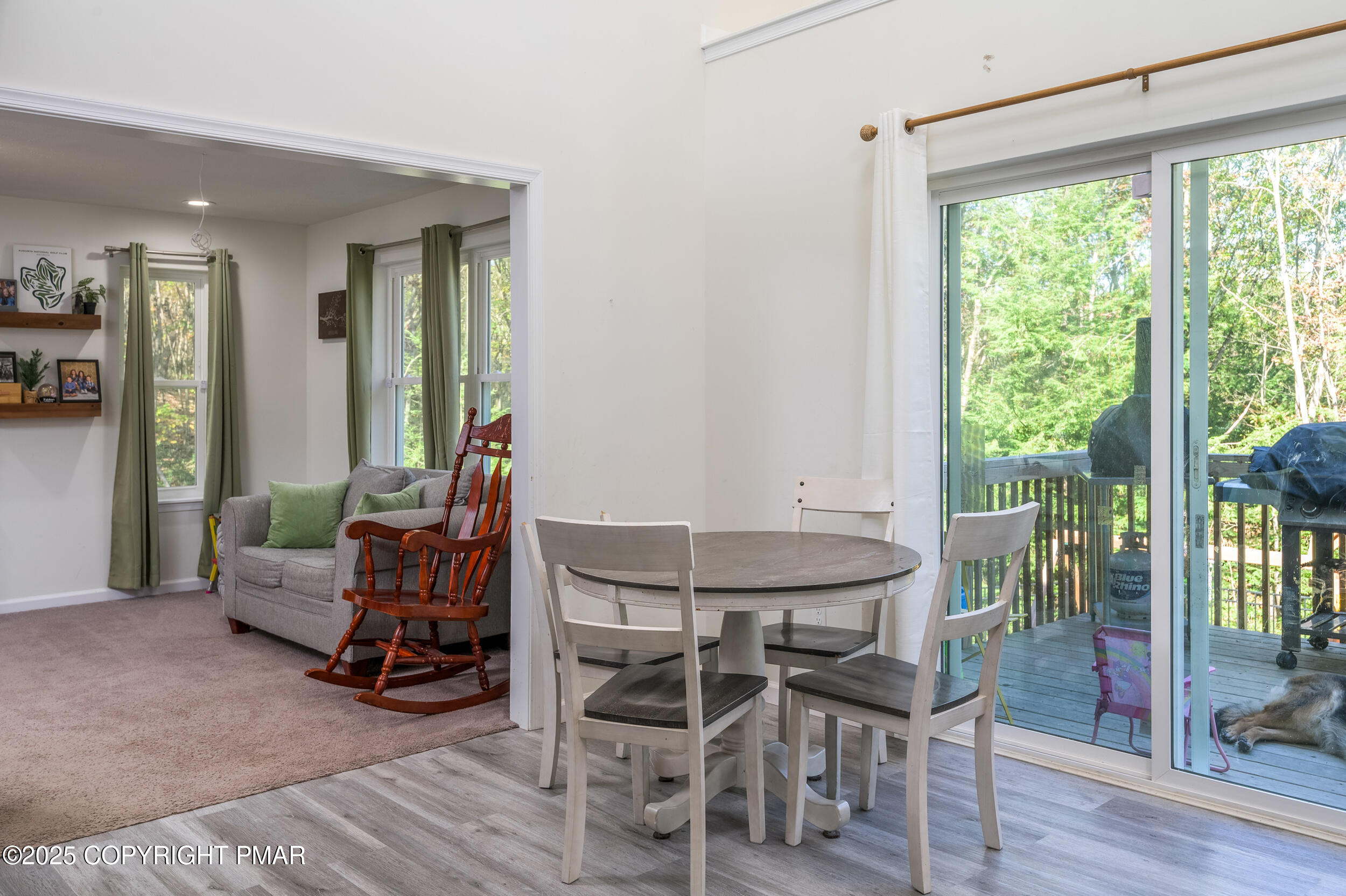322 Russell Court Effort, PA 18330 - Photo 25 of 45 a dining room with furniture and wooden floor