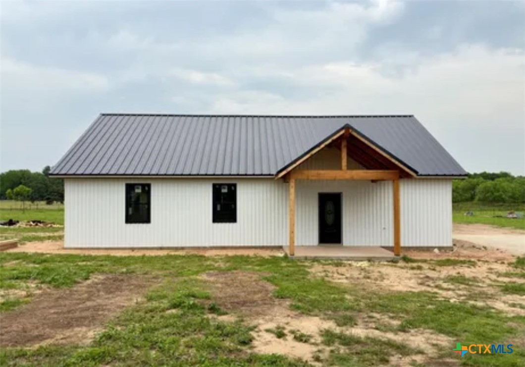 a front view of house with yard