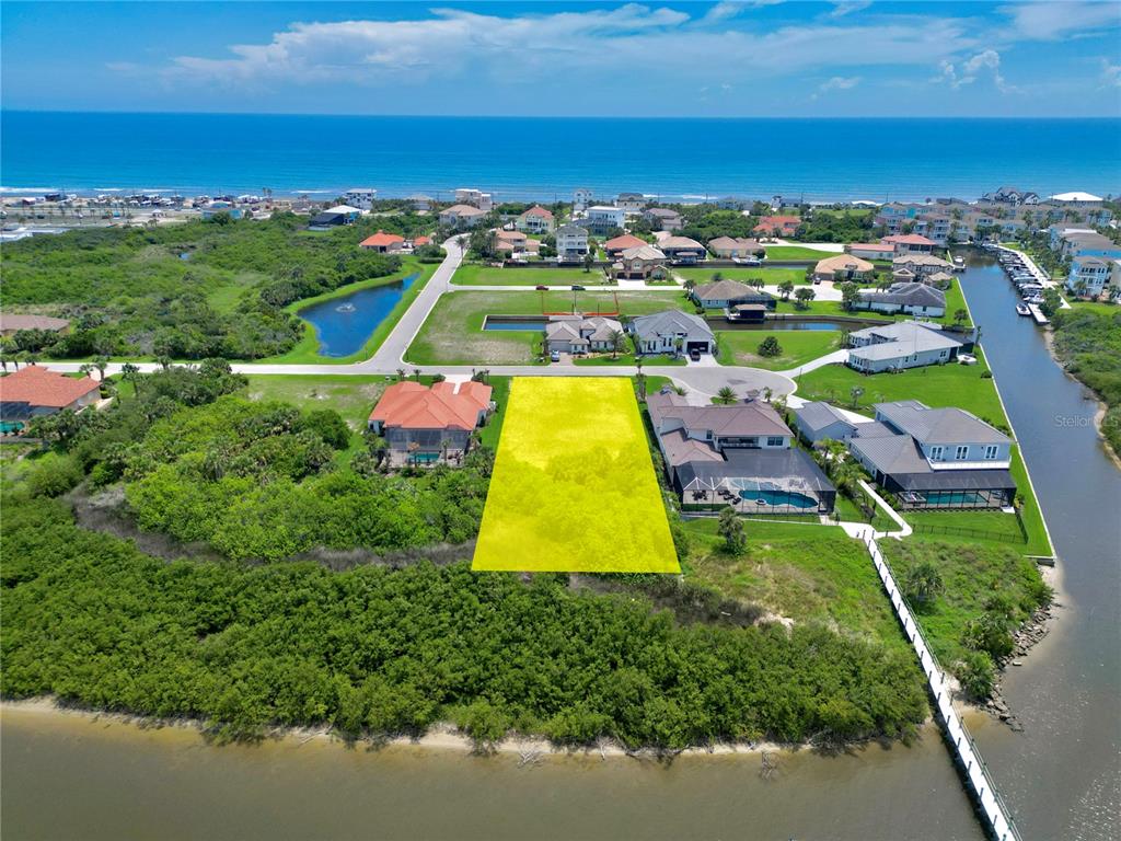 47 Shelter Cove Circle Beverly Beach, FL 32136 - Photo 1 of 21 an aerial view of residential houses with outdoor space and swimming pool