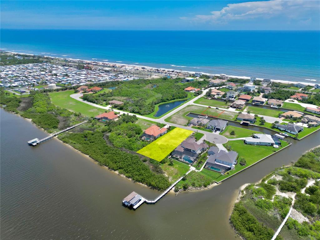 47 Shelter Cove Circle Beverly Beach, FL 32136 - Photo 3 of 21 an aerial view of a tennis court