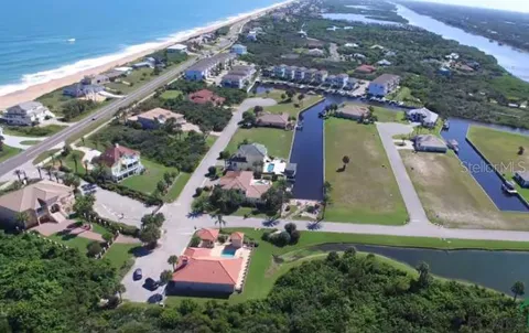 an aerial view of a house with a garden