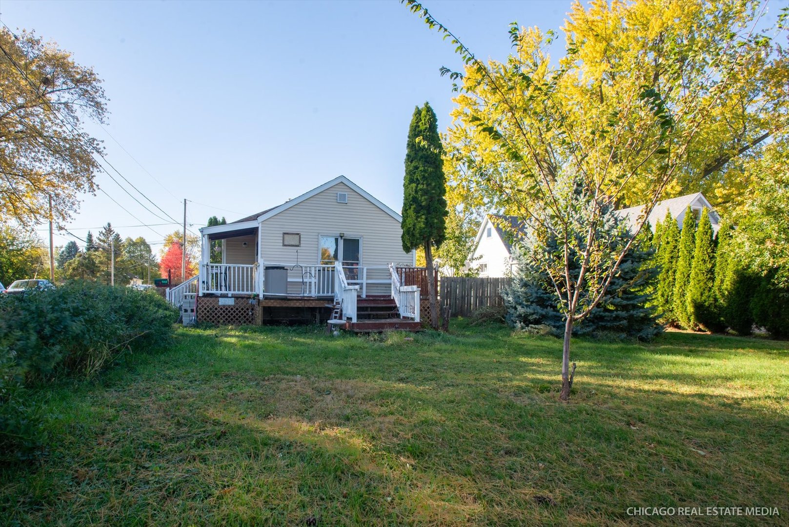 945 South 7th Street DeKalb, IL 60115 - Photo 17 of 18 a front view of a house with garden