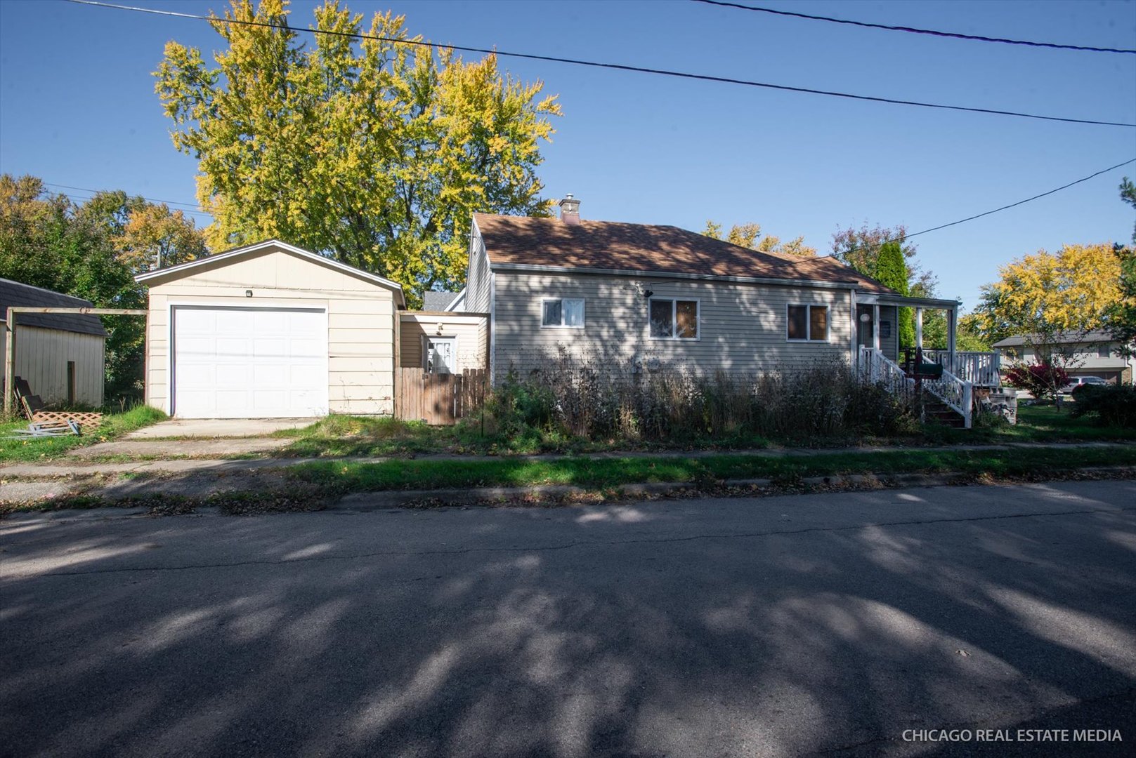 945 South 7th Street DeKalb, IL 60115 - Photo 2 of 18 a front view of a house with garden