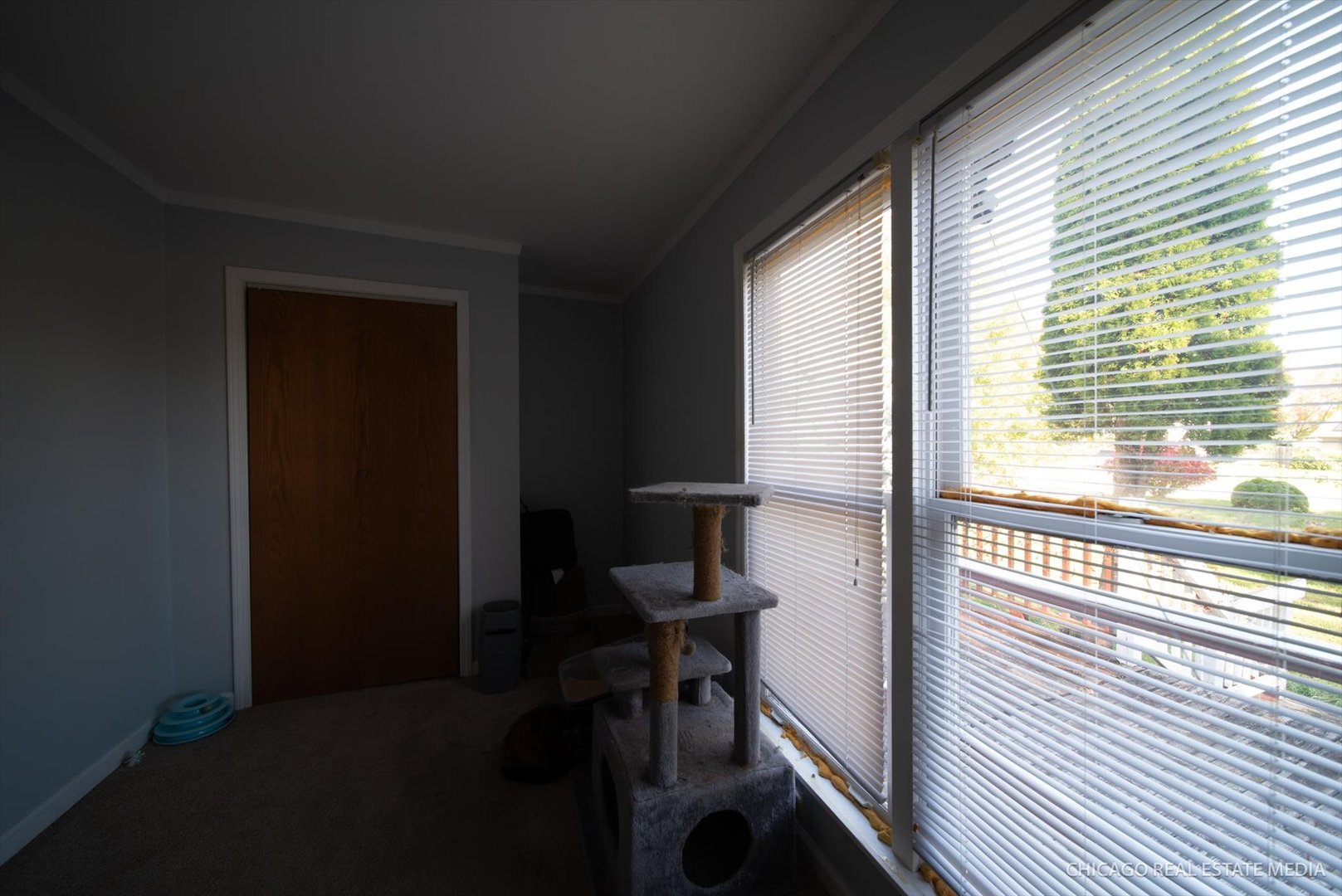 945 South 7th Street DeKalb, IL 60115 - Photo 5 of 18 a view of a hallway with furniture and a window