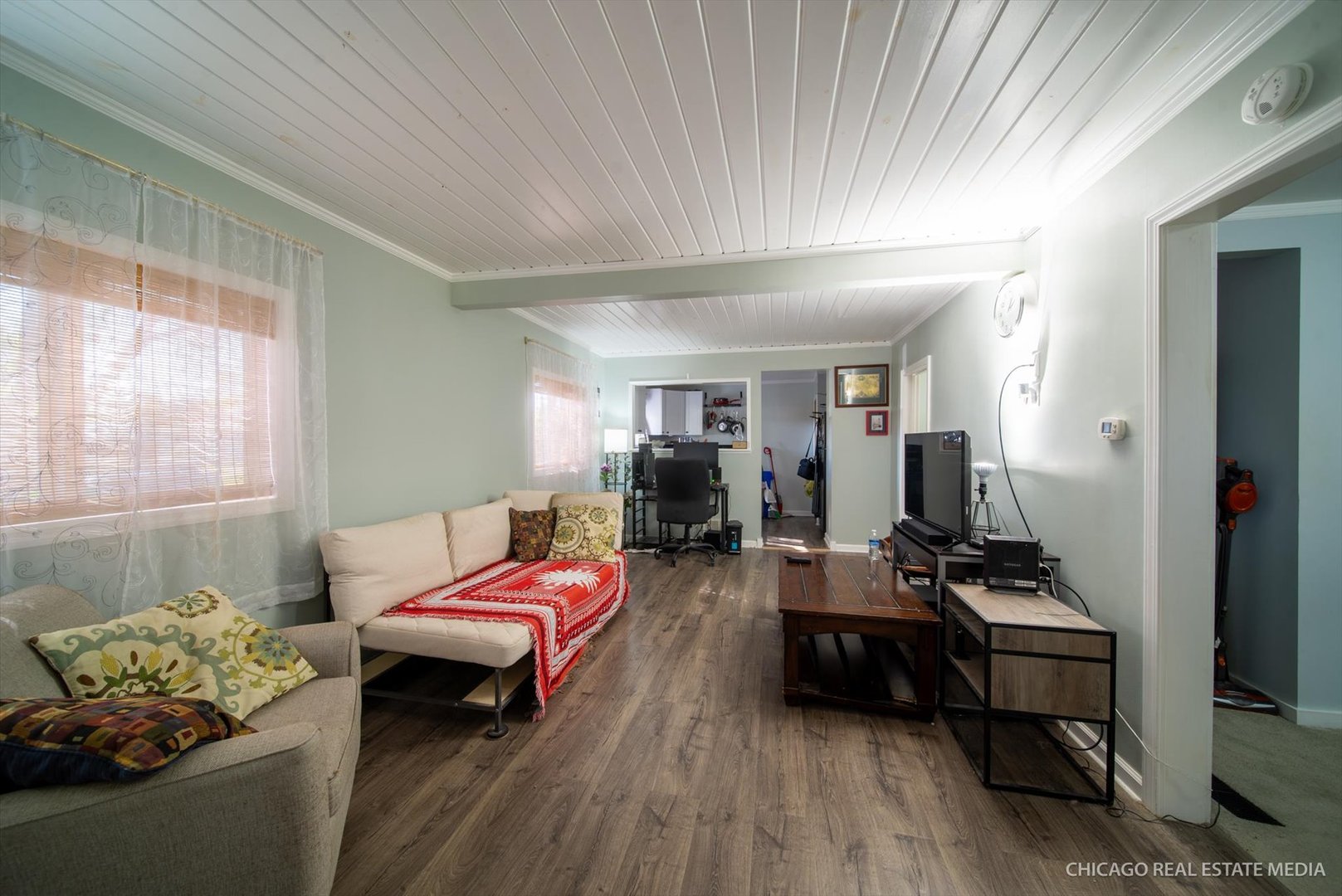 945 South 7th Street DeKalb, IL 60115 - Photo 7 of 18 a living room with furniture and wooden floor