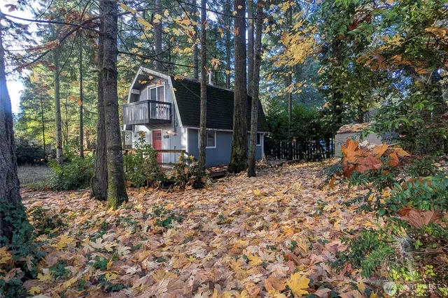 a backyard of a house with lots of green space