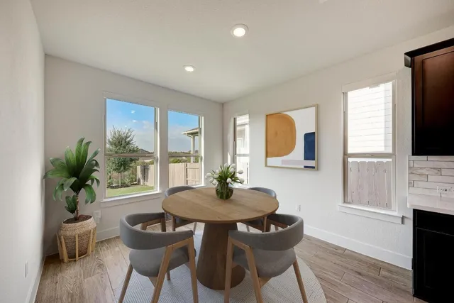 a large kitchen with stainless steel appliances kitchen island a large island in the center