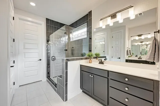 a kitchen with stainless steel appliances granite countertop a stove microwave and refrigerator