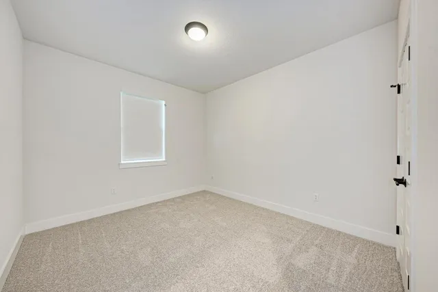 a view of a swimming pool with a yard